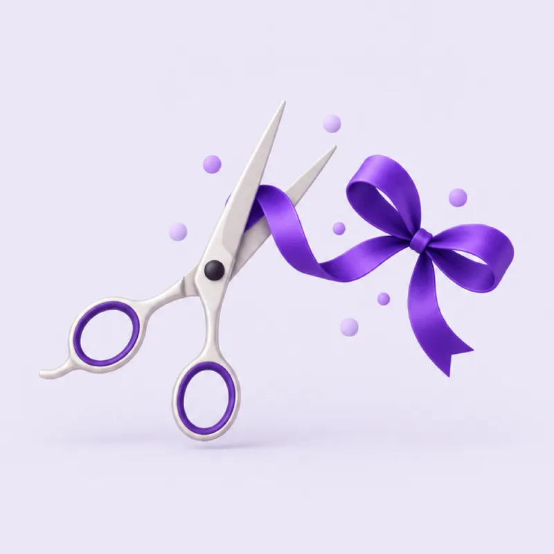 Salon scissors with a violet ribbon curling into a gift bow