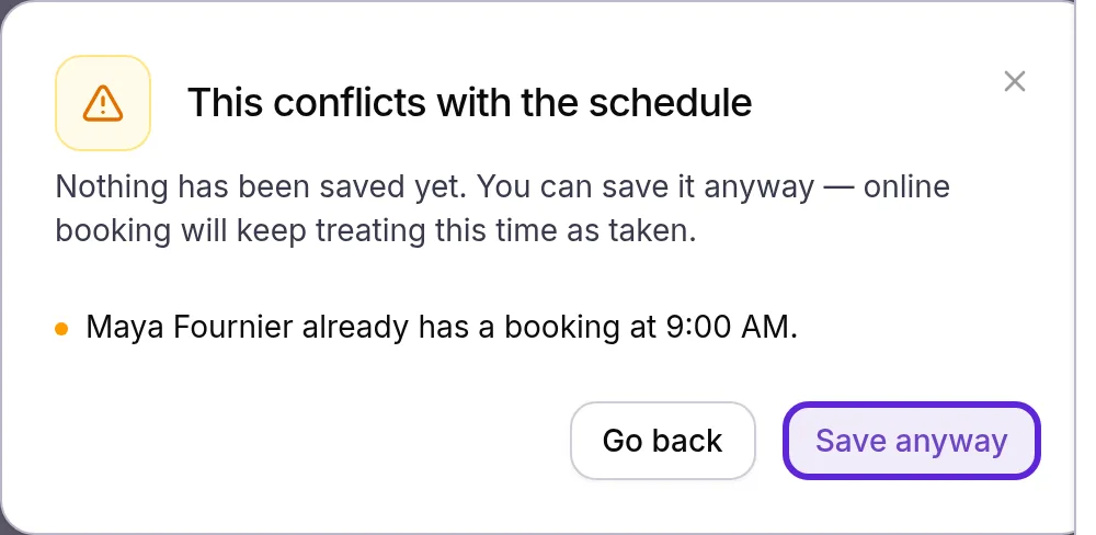 This conflicts with the schedule warning: Maya Fournier already has a booking at 9:00 AM, with Go back and Save anyway